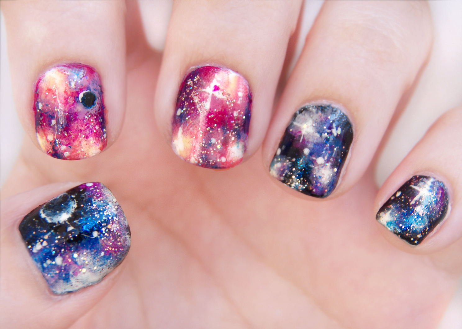 9. Black and Blue Galaxy Nail Art Design for 2024 - wide 6