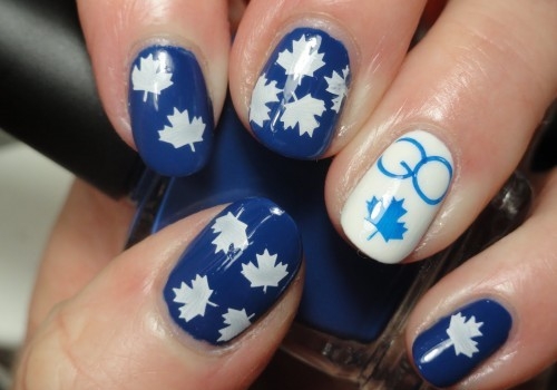 White Maple Leaves on Striking Blue